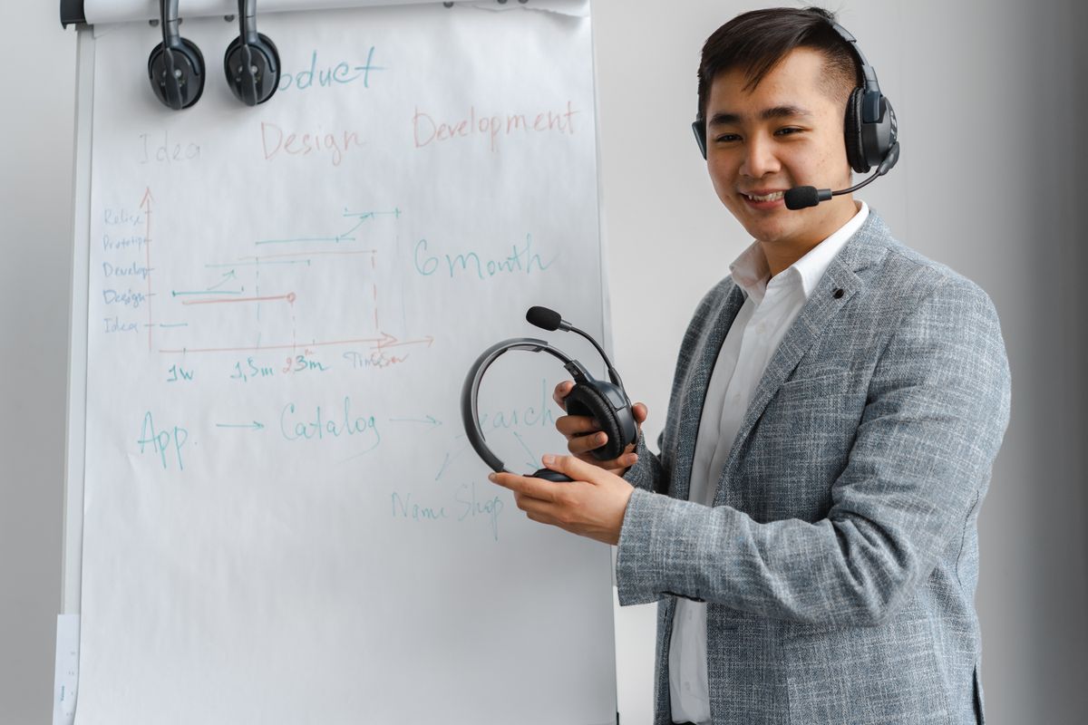 A caller with a headset practicing a call