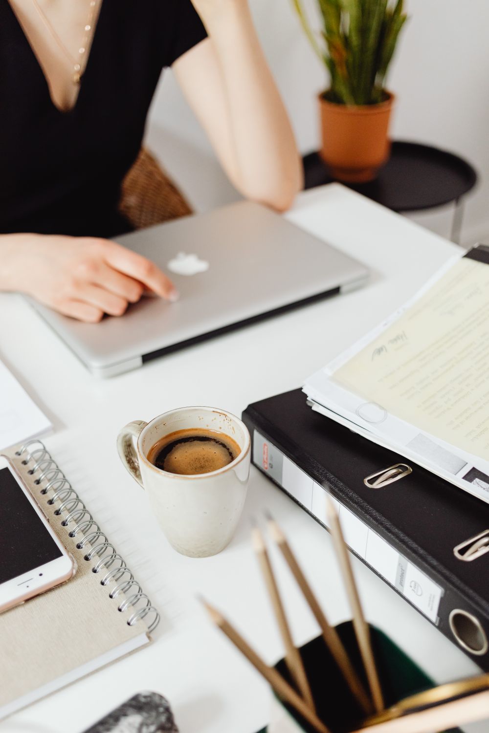 A desk set up for tracking payments
