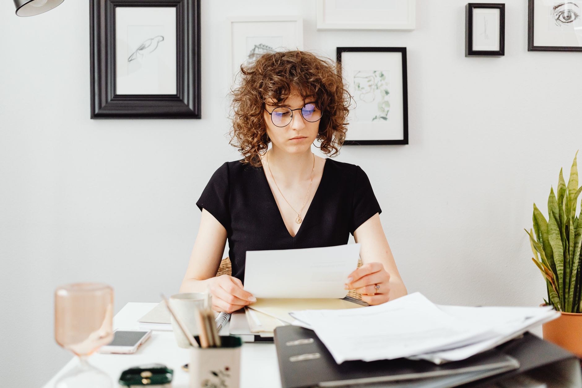 Editorial photo for Can I Sue My Employer for Emotional Distress in Illinois, showing employment records and workplace documents.
