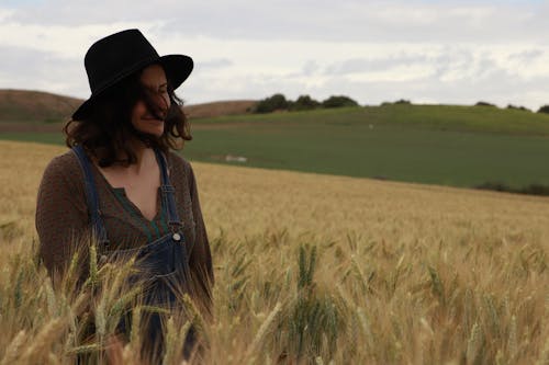 Woman Standing in a Field