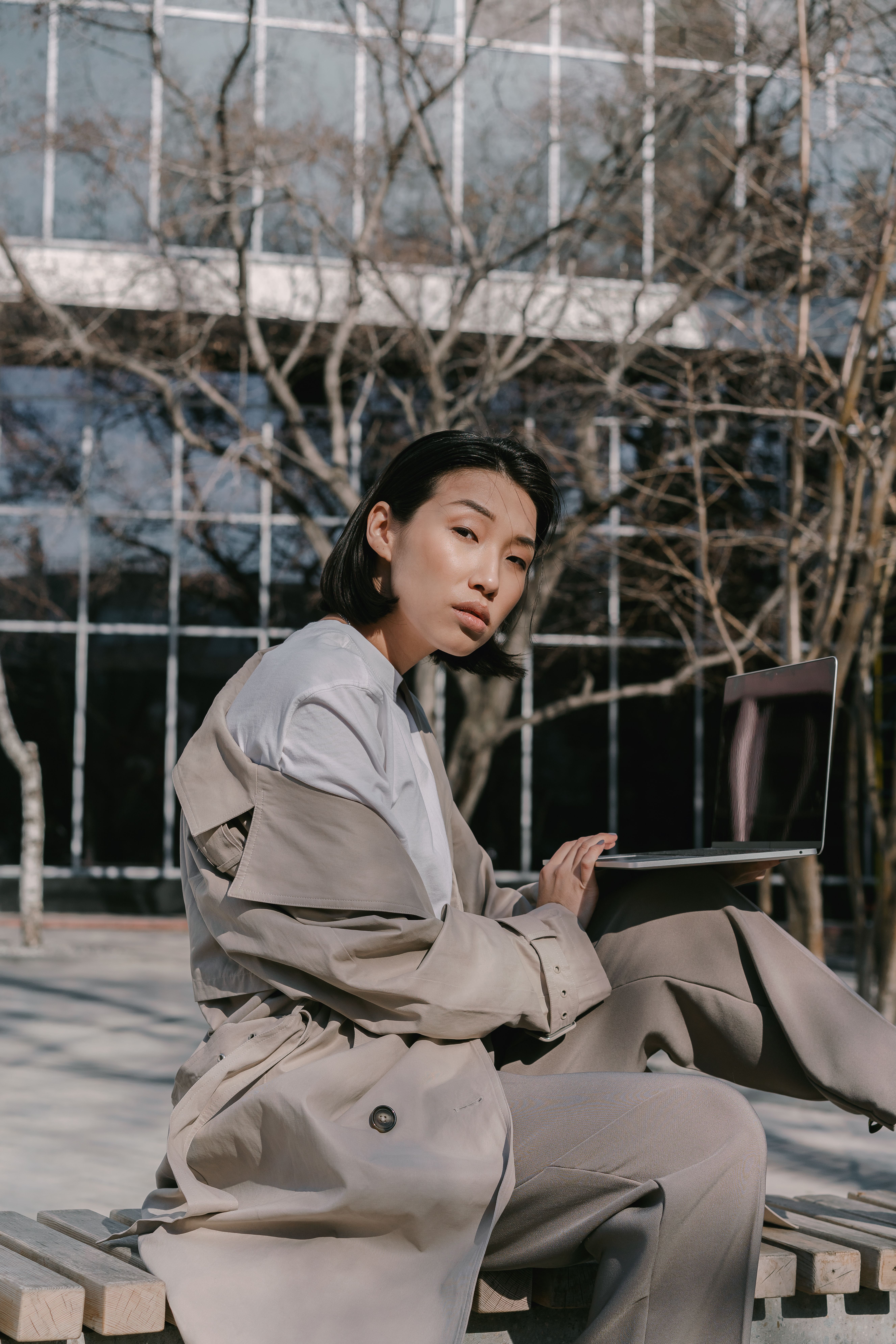 A Woman in Brown Coat Sitting on the Bench · Free Stock Photo