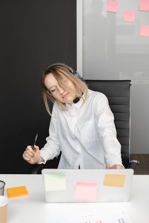 Free Woman Working in a Call Center Stock Photo
