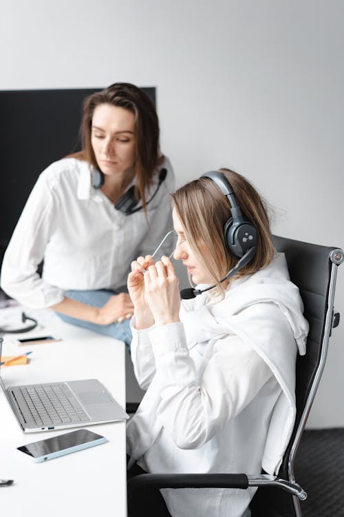 Free Women Working in a Call Center Stock Photo