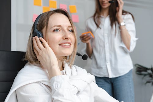 Free Shallow Focus of Woman Working in a Call Center Stock Photo