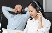 Shallow Focus of Woman Working in a Call Center