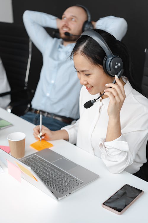 Free Call Center Agent Working in an Office Stock Photo