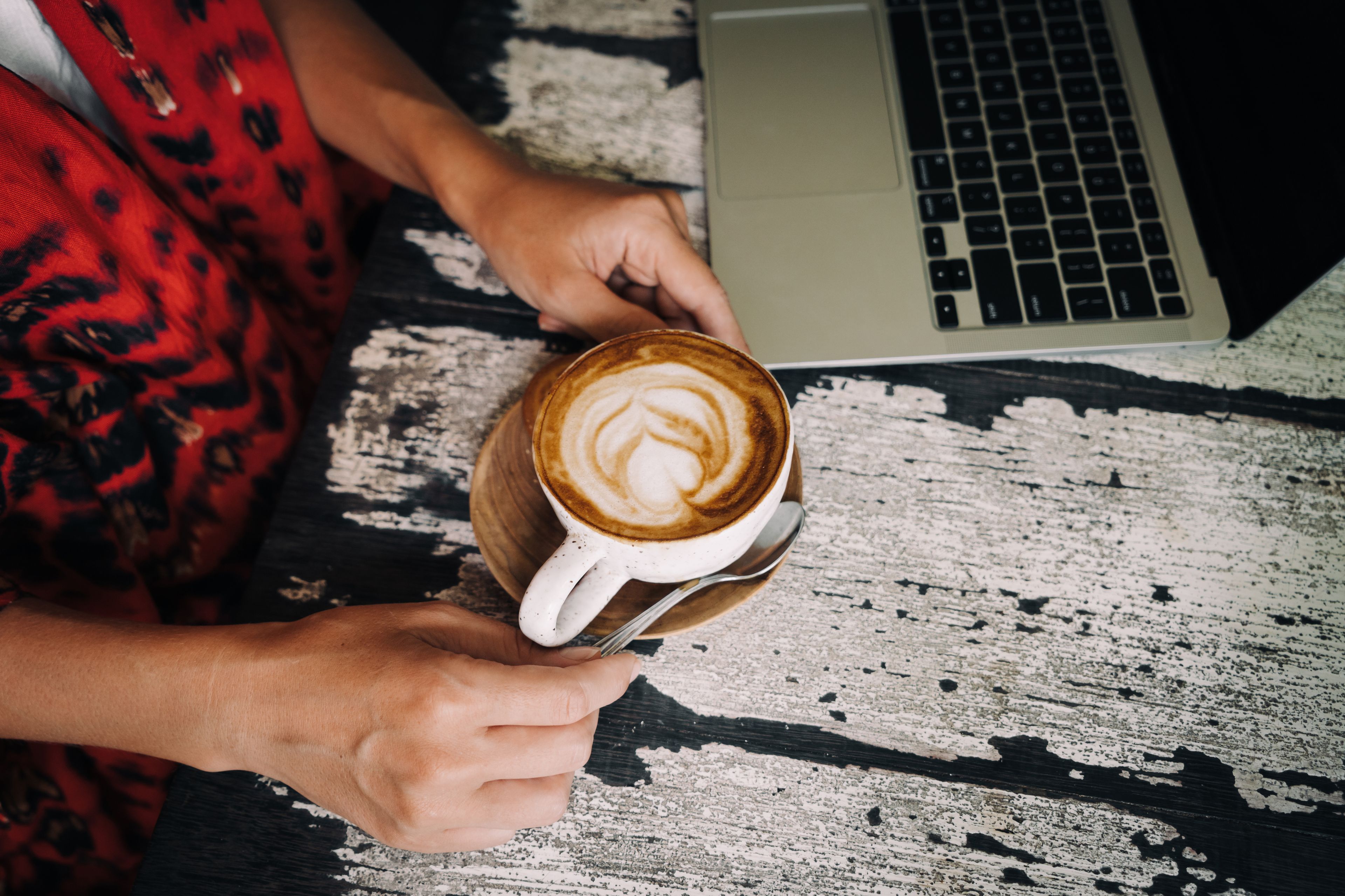 Digital nomad working from a café in Bali, Indonesia