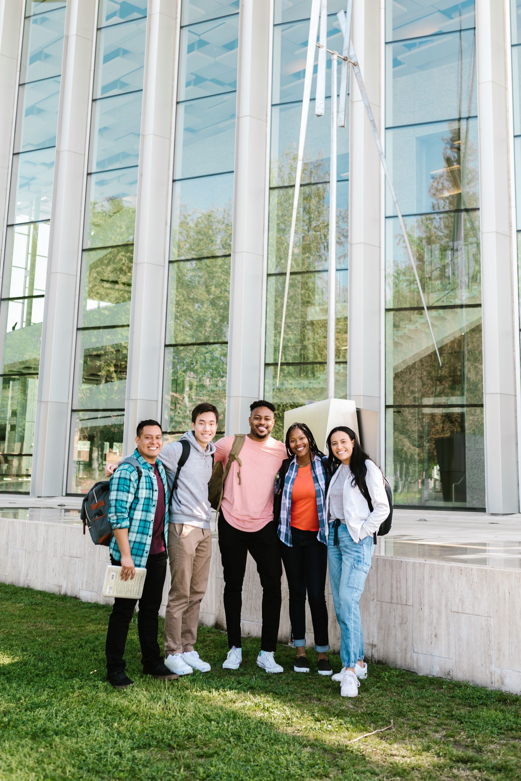 A diverse group of university students together on campus