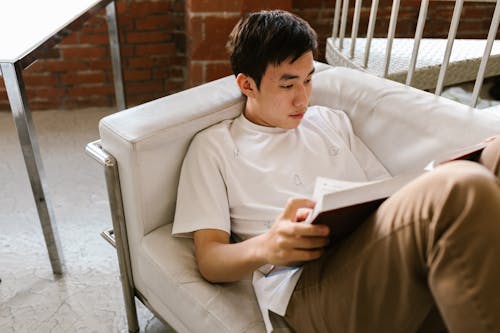 Gratis lagerfoto af asiatisk dreng, bog, Dreng Lagerfoto