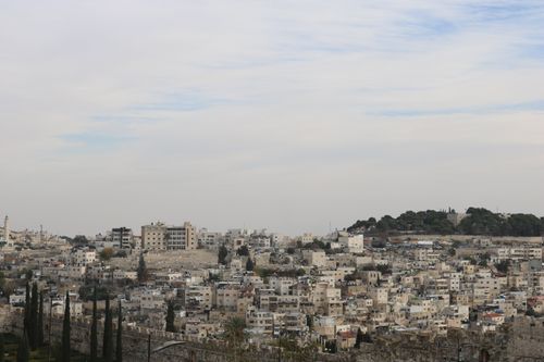 Free Aerial view of the historical architecture of Jerusalem, showcasing old city buildings and skyline. Stock Photo
