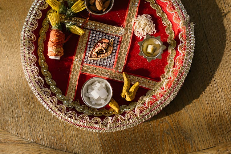 A Close-Up Of A Puja Thali Set