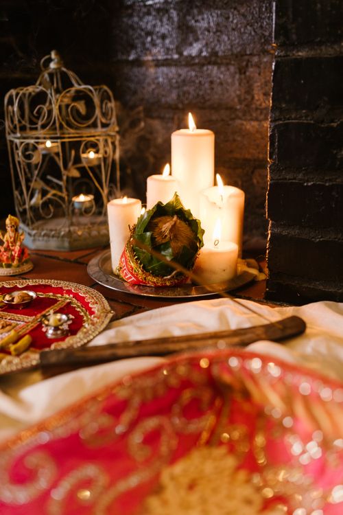 Free A cozy Indian ceremony setting with candles and traditional decorations, exuding warmth and cultural richness. Stock Photo