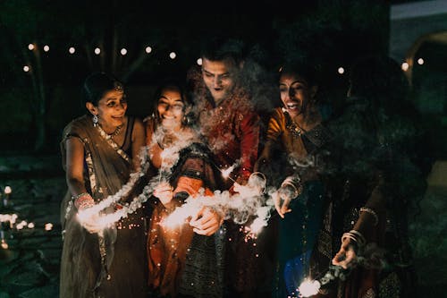 Free A Happy Family Celebrating Diwali Stock Photo