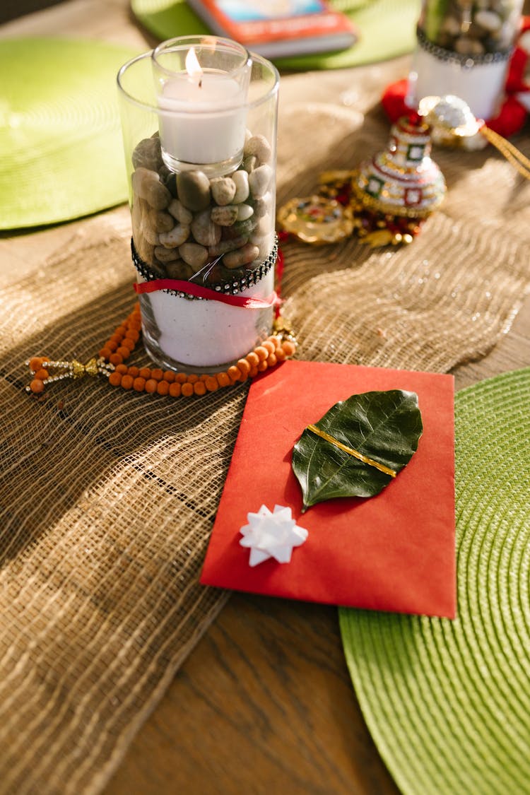 Red Envelope Decorated With Leaf And Ribbon