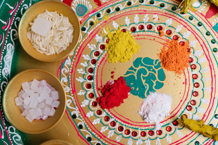 Colorful Powders And Grains In A Bowl On A Flat Surface