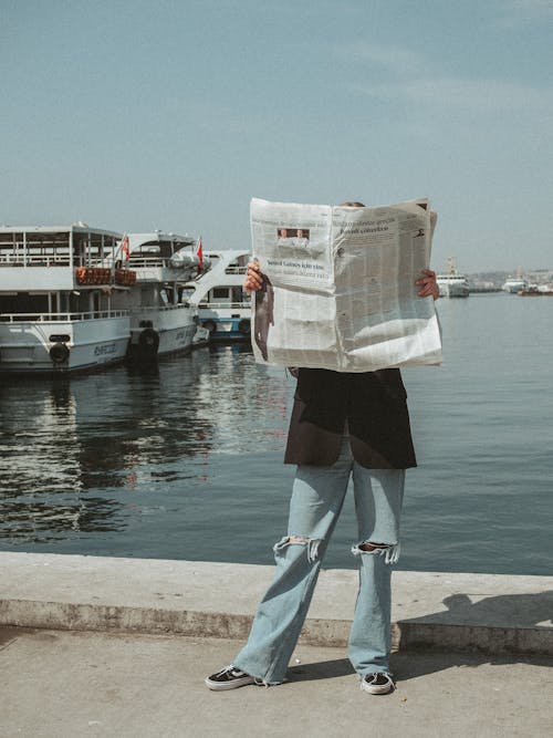 A Person Reading Newspaper