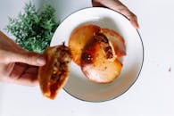 Person Holding White Ceramic Plate With Food