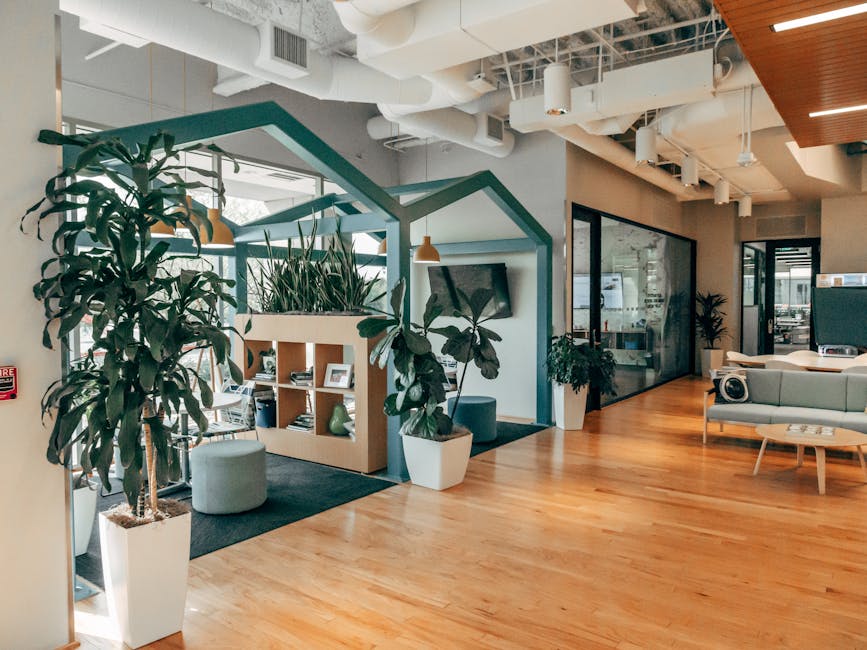 A bright and modern office interior with collaborative spaces and natural light - commercial design build A bright and modern office interior with collaborative spaces and natural light - commercial design build