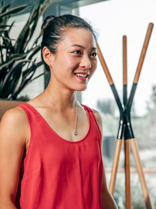 Portrait of a Woman in a Red Tank Top