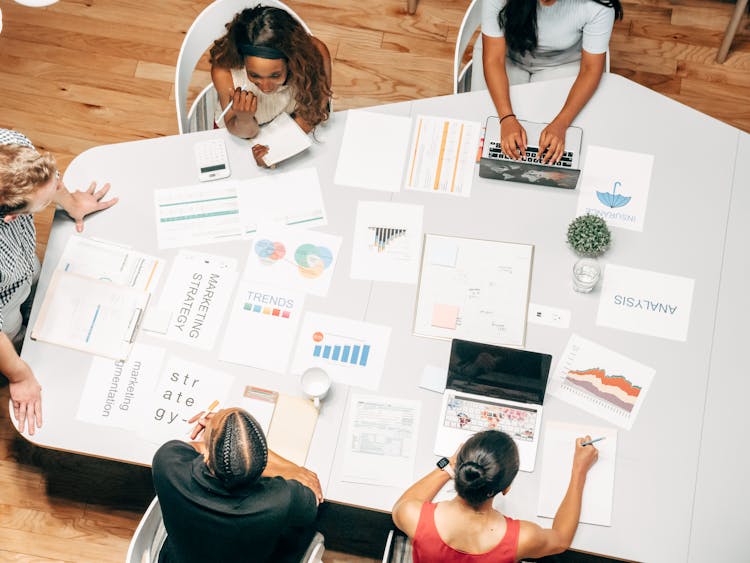 Overhead Shot Of People In A Meeting