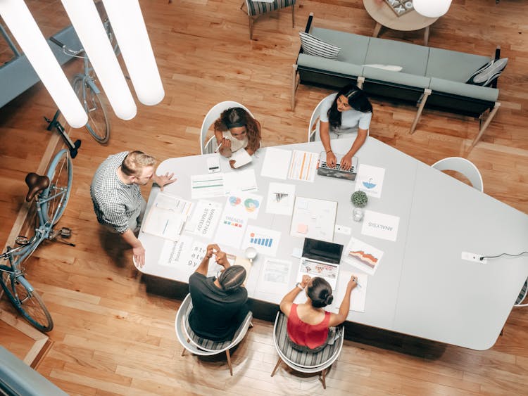 Overhead Shot Of People In A Meeting