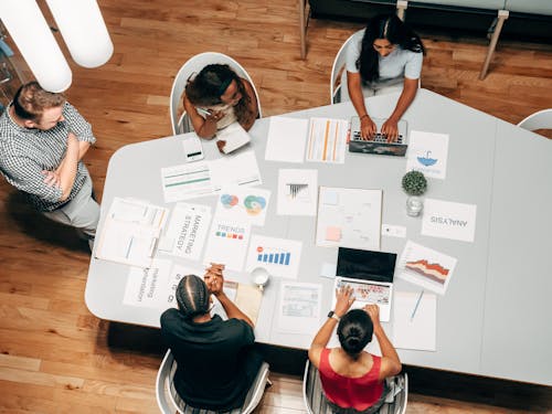 Free People in the Office Discussing a Project Stock Photo