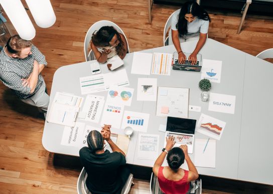 Marketing team creating content and campaigns with AI
