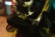 A Close-Up Shot of a Person with Prosthetic Arms