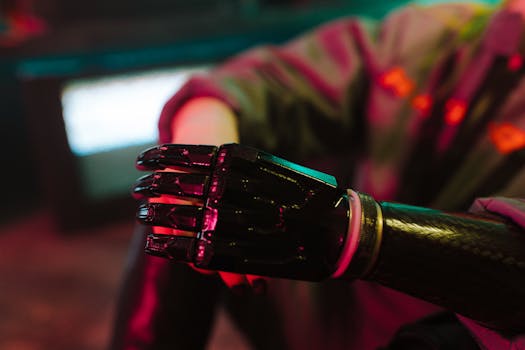 A close-up view of a futuristic bionic prosthetic arm in neon lighting.