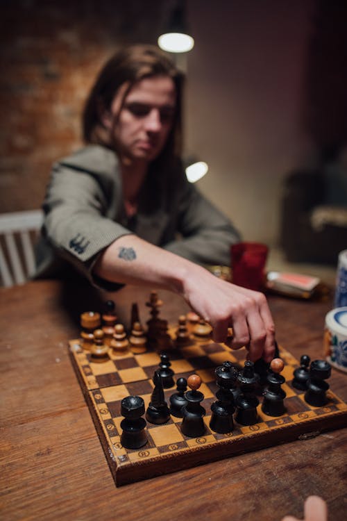 Woman Playing Chess Game 