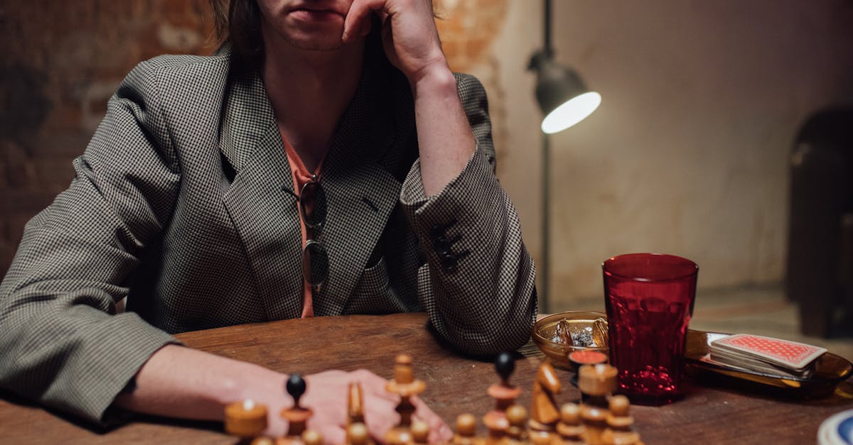 A Man Thinking while Playing Chess · Free Stock Photo