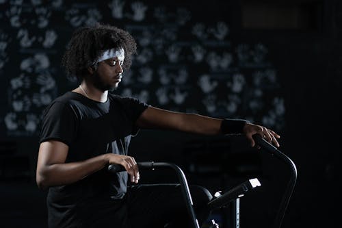 Man in Black Activewear Exercising