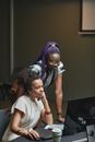 Women with Headphones Working Together