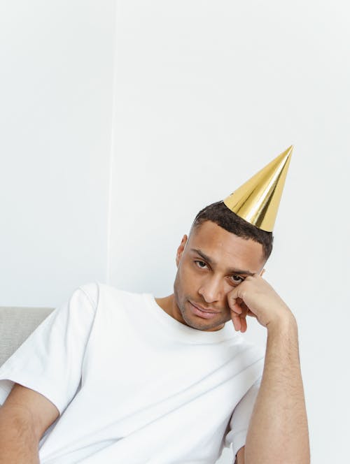 Man Wearing Party Hat