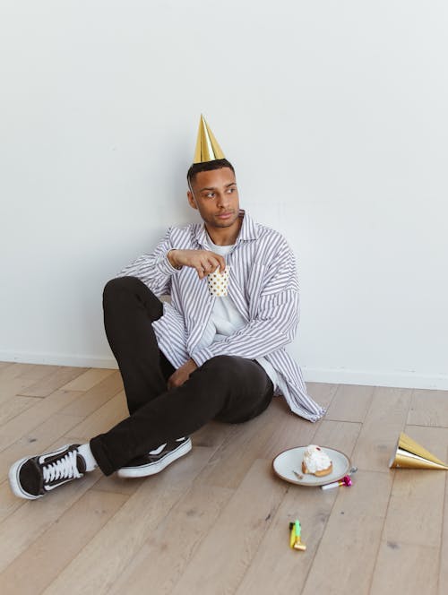 Man Wearing a Party Hat