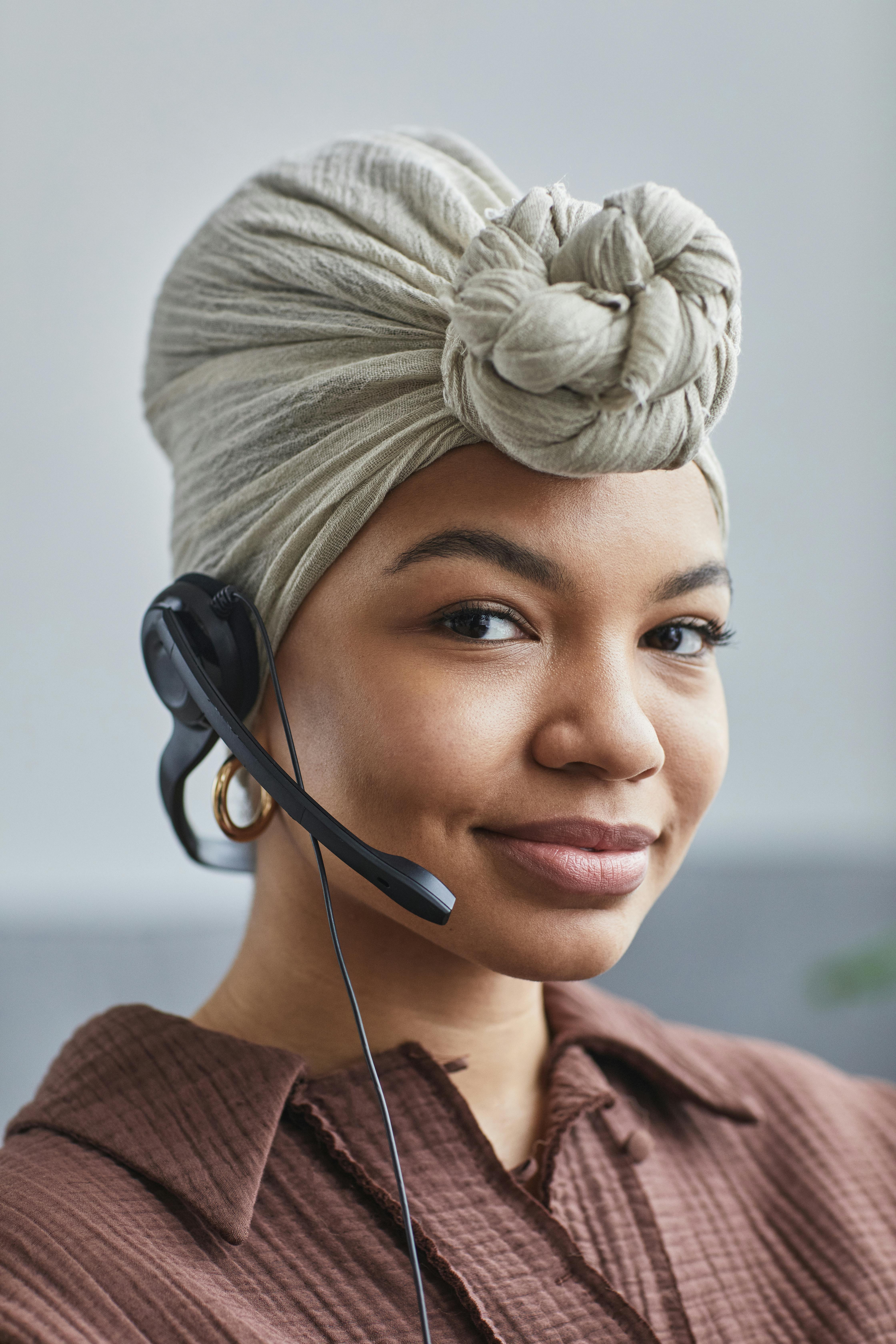 A Woman Wearing Head Wrap Free Stock Photo