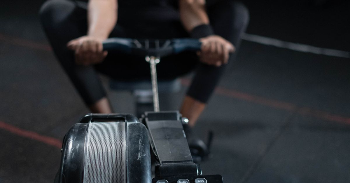 Fla. Man Rowing Machine Man Using a Rowing Machine · Free Stock Photo