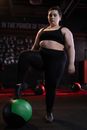 Woman in Black Sports Bra and Black Leggings