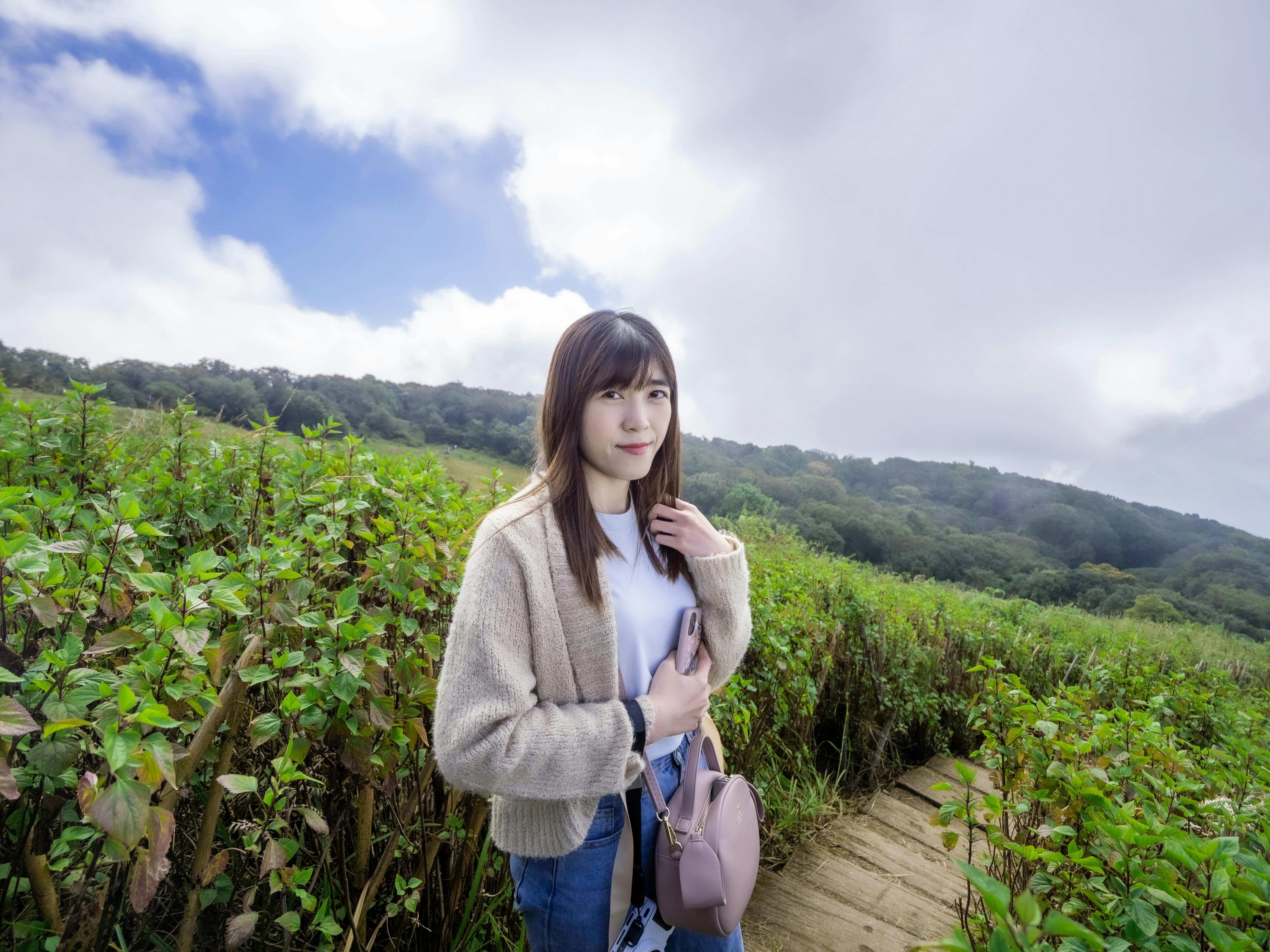 Person looking at beautiful sunrise from mountain top