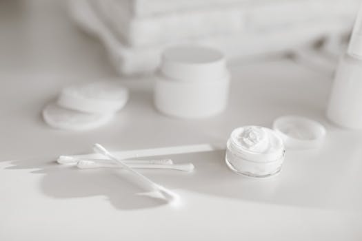 Elegant close-up of skincare products, showcasing minimalist beauty with soft focus.