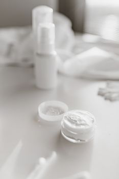 Elegant display of skincare products emphasizing pure ingredients and clean design.
