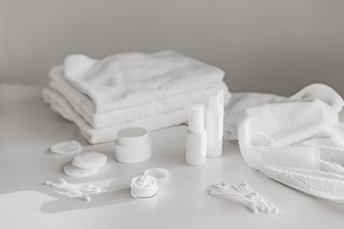 Free White Towel on White Table Stock Photo