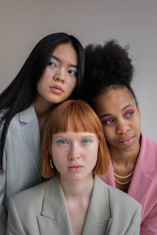 Free Multiracial women with bright eyeshadows in studio Stock Photo