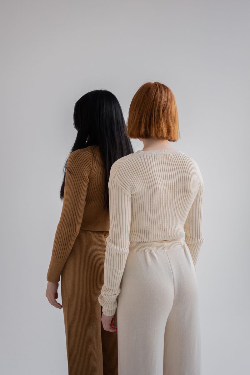 woman in matching camel knit two-piece set
