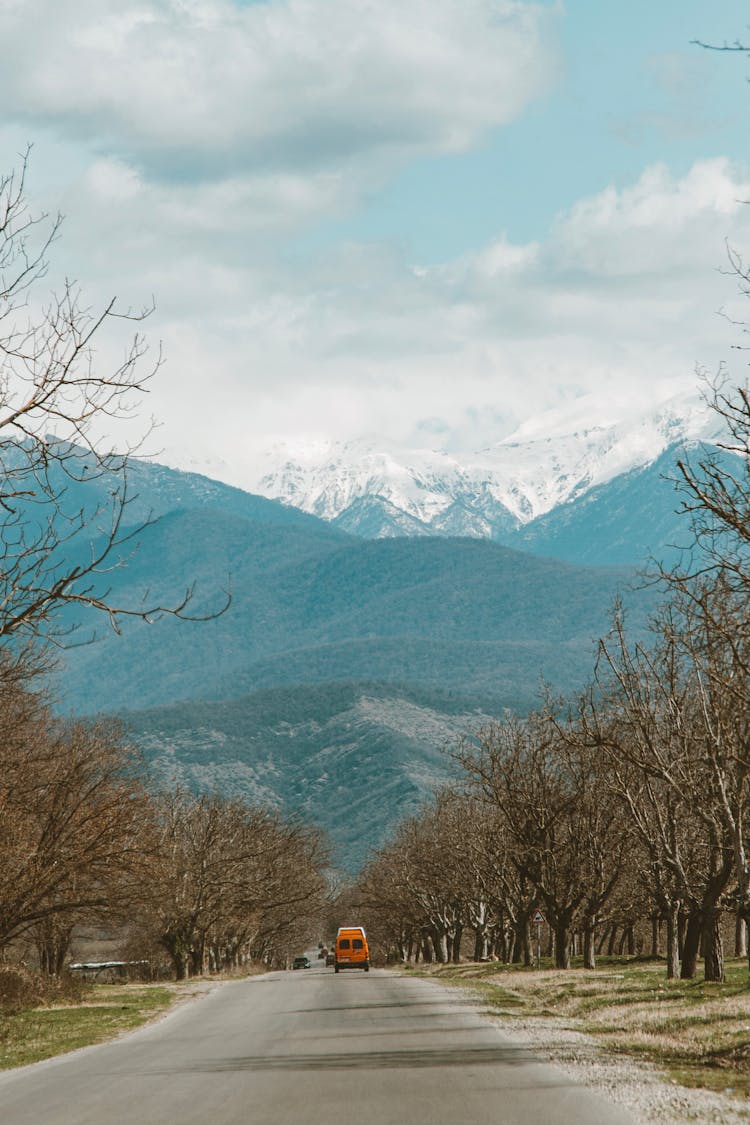 Road And Mountains Behind