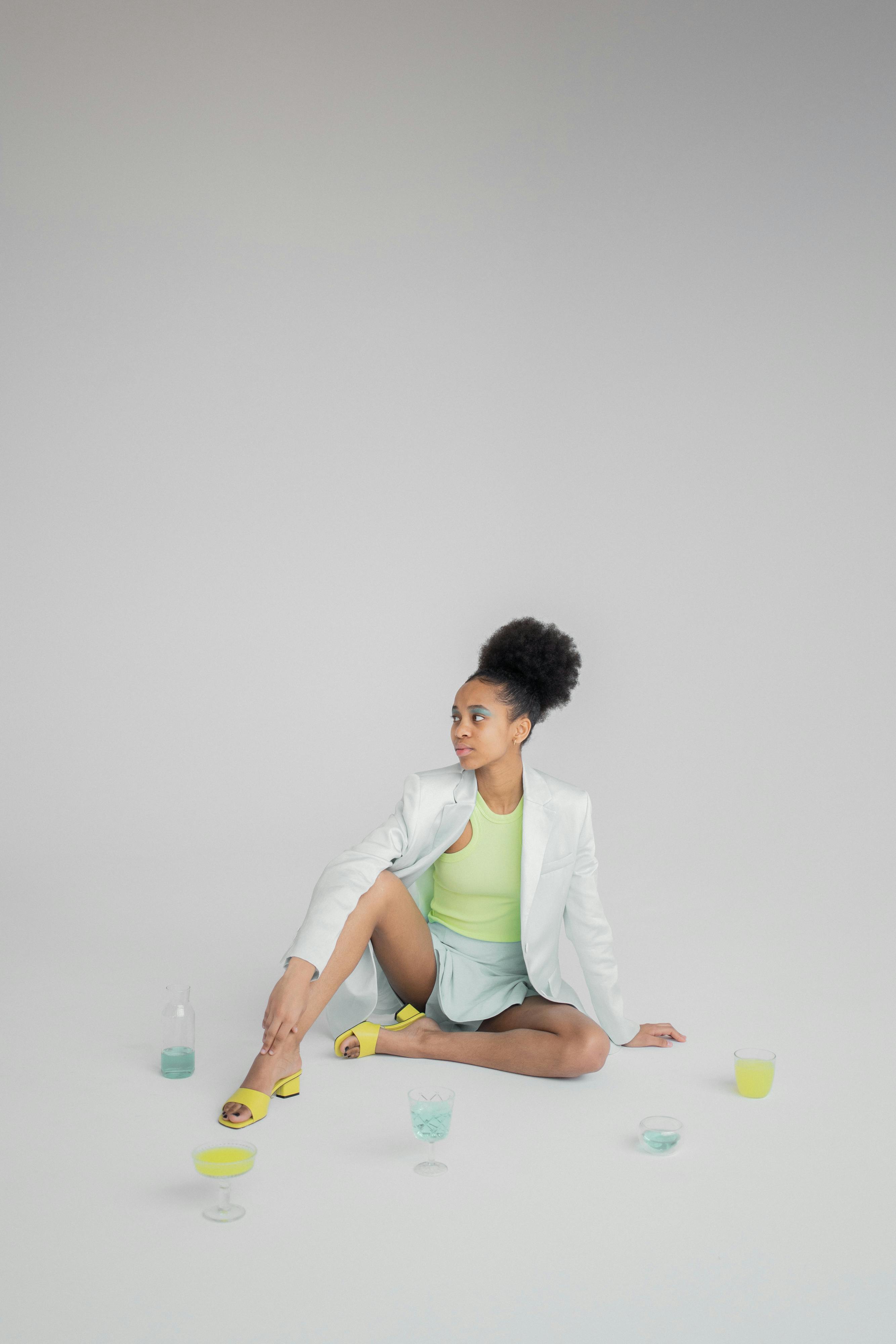 young african american female sitting on floor