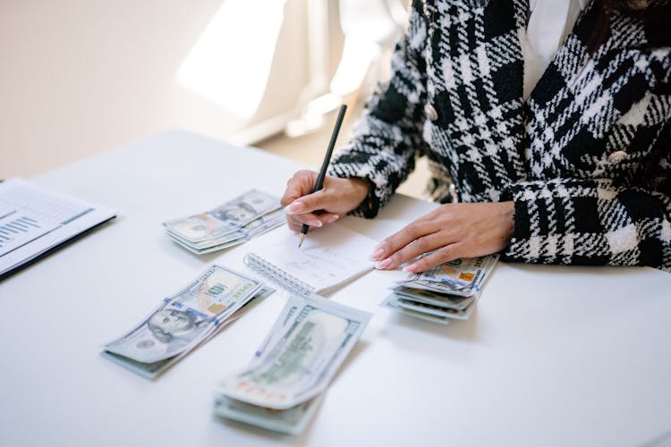 Woman Hands Counting Dollars