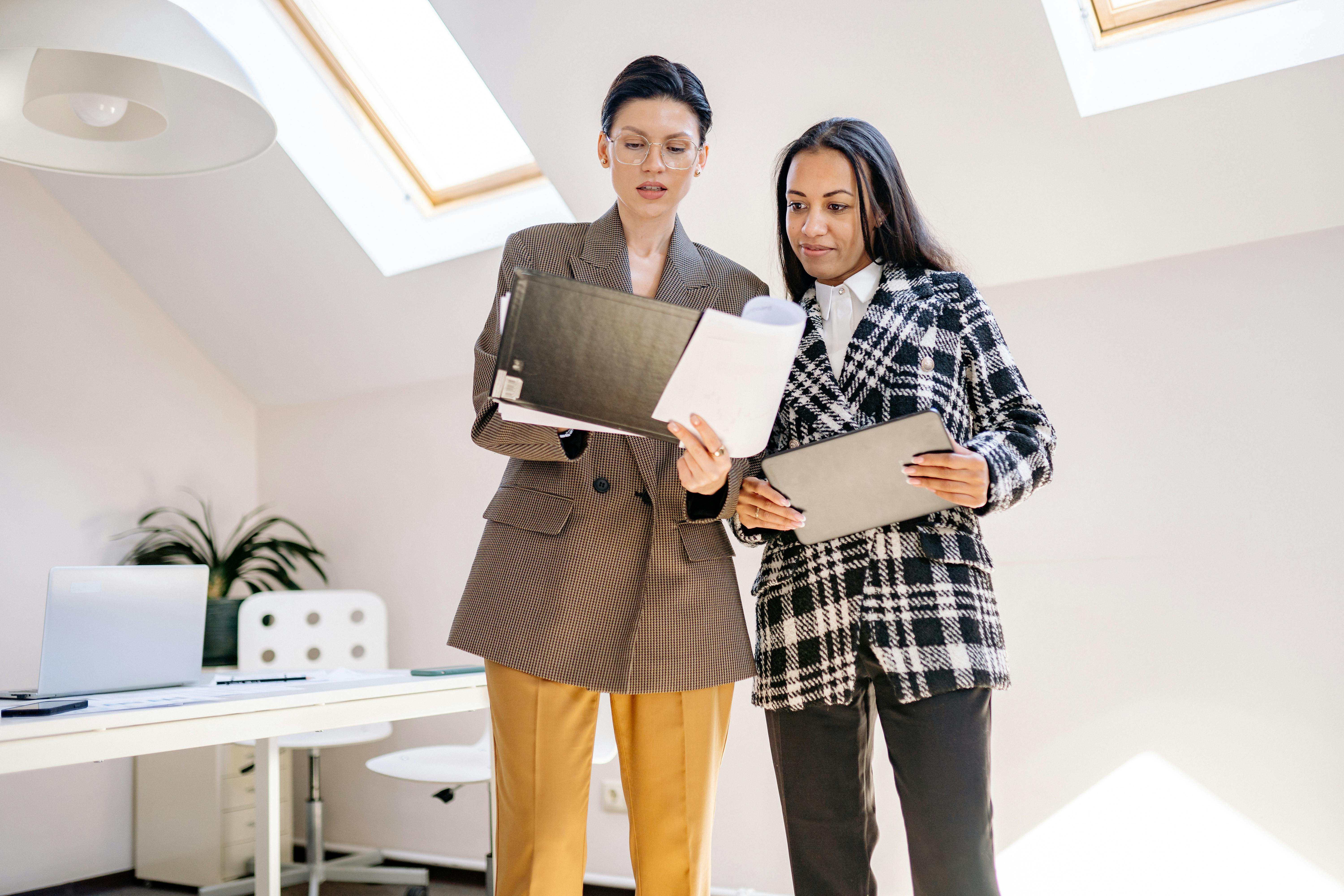 Two Women Standing Side By Side · Free Stock Photo