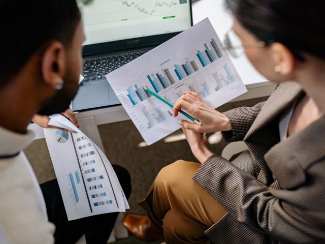 Team members reviewing a network diagram together