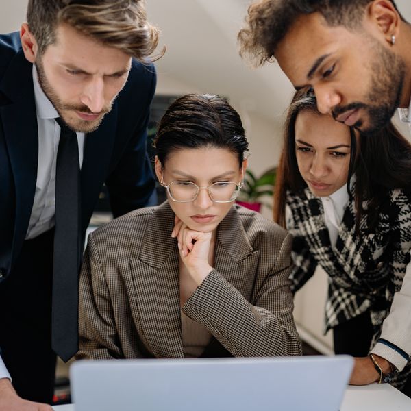 New starters collaborating over laptops — photo by Yan Krukau on Pexels